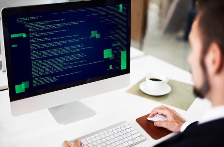 Programmer Coding in the Office